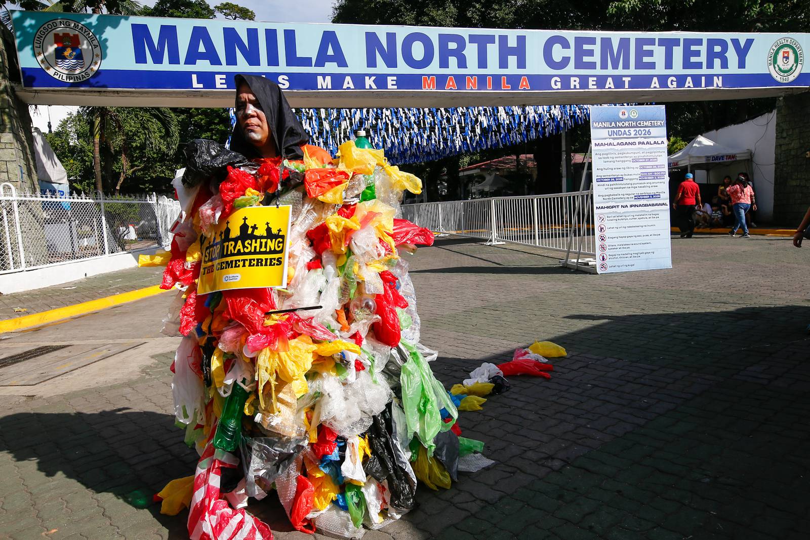 Members of the EcoWaste Coalition gather at the Manila North Cemetery on 29 October 2026 to reiterate their call for an eco-friendly and zero-waste observance of Undas.