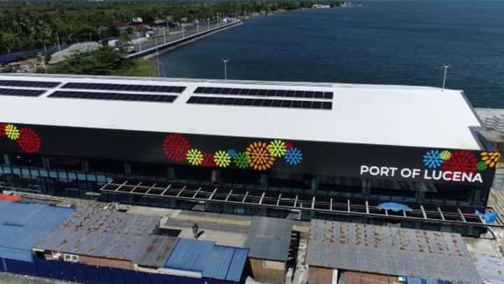 An aerial view of the upgraded Port of Lucena passenger terminal in Quezon province shows its solar-panel installation and expanded facilities. The Philippine Ports Authority has highlighted the terminal's readiness to accommodate travelers during the Undas 2026 holiday period.