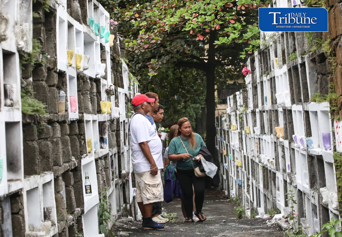 (October 30 2026) Families early visit their departed loved ones to avoid crowds at Bagbag Cemetery in Quezon City on Friday, 30 October 2026, ahead of All Souls’ Day. In observance of Undas, the Quezon City government reminded the public that visiting hours at Bagbag and Novaliches cemeteries will be from 6 a.m. to 10 p.m., Also all burial operations will be temporarily suspended from 31 October to 2 November 2026, according to an official notice from the local government. Photo/Analy Labor