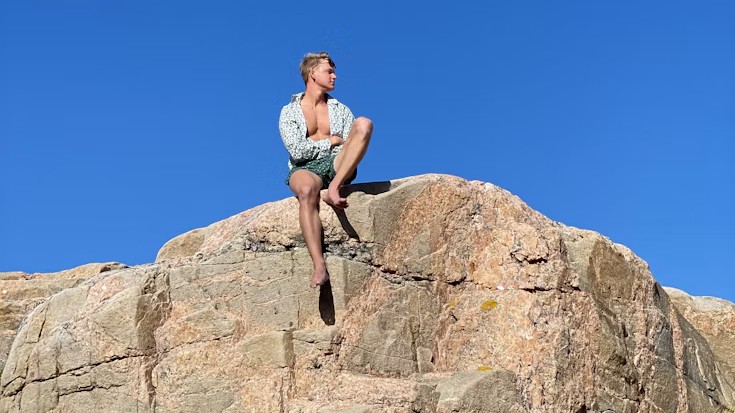 Sitting by the rocks