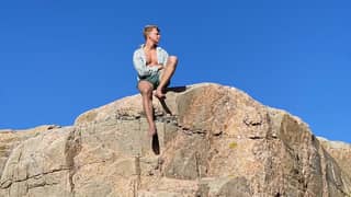 Sitting by the rocks