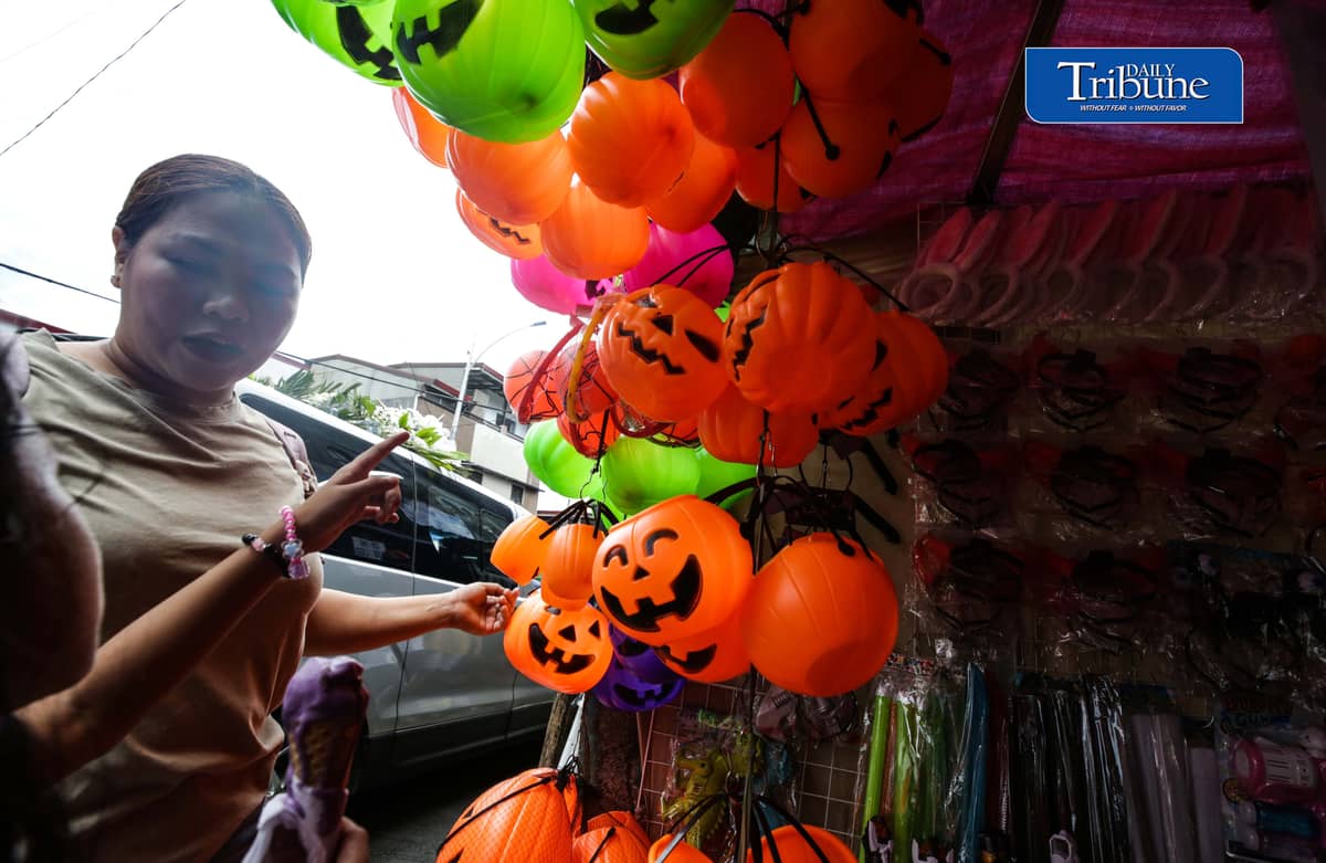 Vendors tend their customers buying Halloween trick or treat baskets for their kids to use for Halloween celebrations, observed annually on 31 October, dedicated to remembering the dead, before the All Saints Day and All Souls Day celebration.