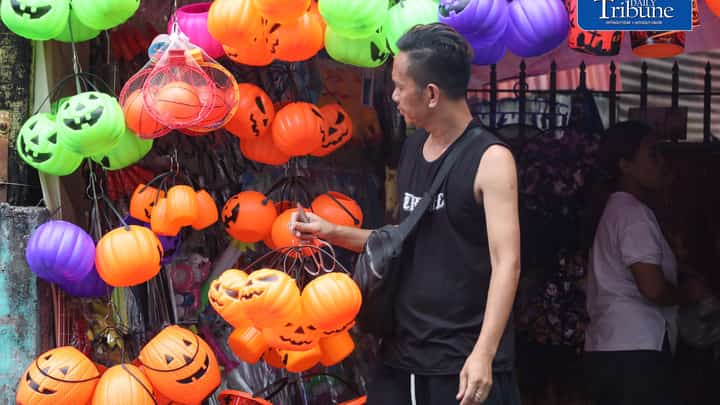 Vendors tend their customers buying Halloween trick or treat baskets for their kids to use for Halloween celebrations, observed annually on 31 October, dedicated to remembering the dead, before the All Saints Day and All Souls Day celebration.