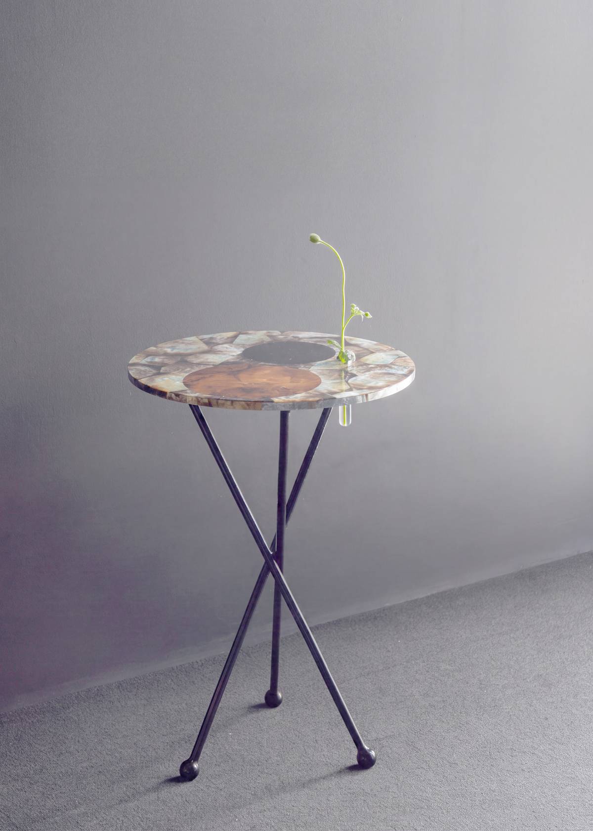 A SCULPTURAL accent table inspired by the deep sea.