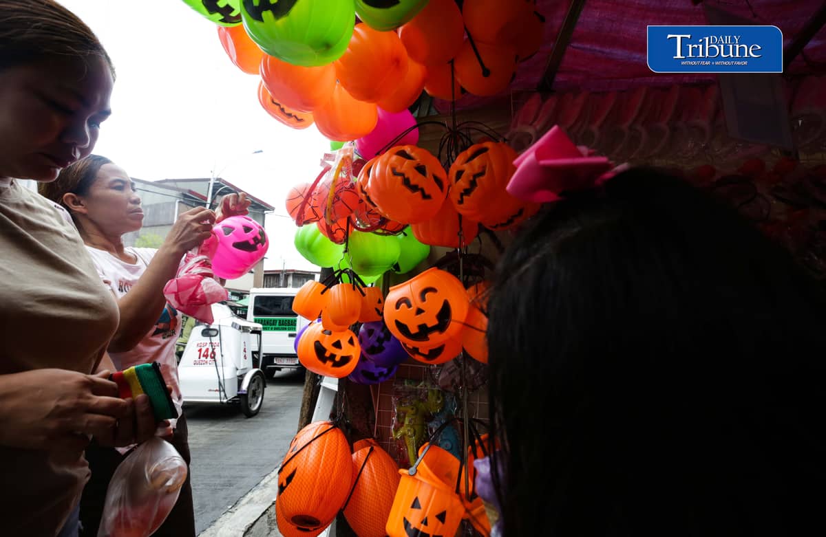 Vendors tend their customers buying Halloween trick or treat baskets for their kids to use for Halloween celebrations, observed annually on 31 October, dedicated to remembering the dead, before the All Saints Day and All Souls Day celebration.