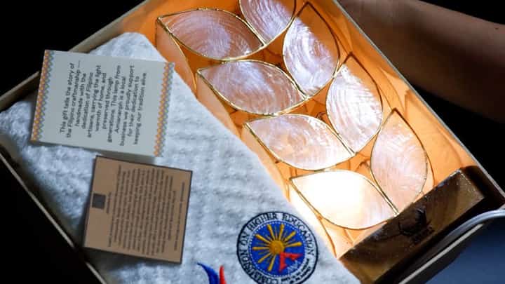 ASEAN GIVEAWAYS. Souvenirs produced by Amiananph, which called out CHED and DOE over unpaid orders. The DOE responded 14 hours later, saying its check was ready.