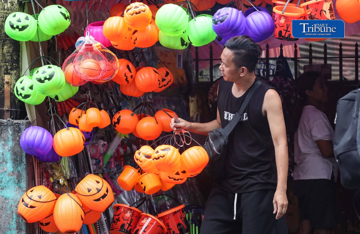 Vendors tend their customers buying Halloween trick or treat baskets for their kids to use for Halloween celebrations, observed annually on 31 October, dedicated to remembering the dead, before the All Saints Day and All Souls Day celebration.