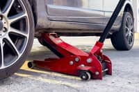 Tire repairman killed after dump truck jack slips