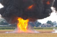 Four tankers on fire after hitting mines