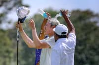 MICAH Shin gets the traditional celebratory dousing after capturing the ICTSI Apo Golf Classic at Apo Golf and Country Club in Davao City on Friday.