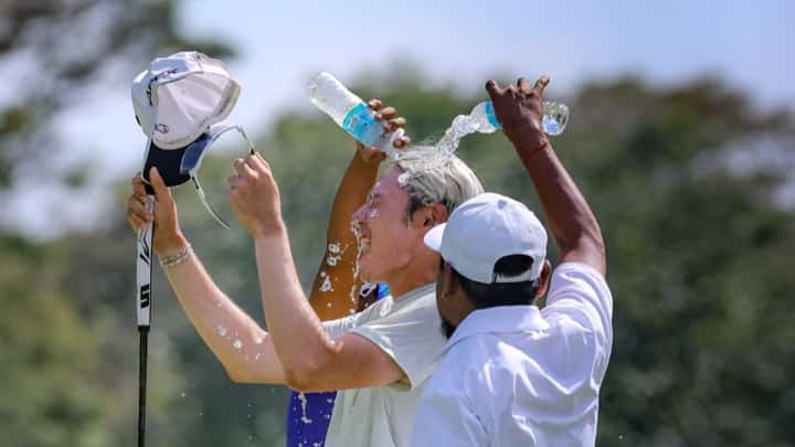 MICAH Shin gets the traditional celebratory dousing after capturing the ICTSI Apo Golf Classic at Apo Golf and Country Club in Davao City on Friday.