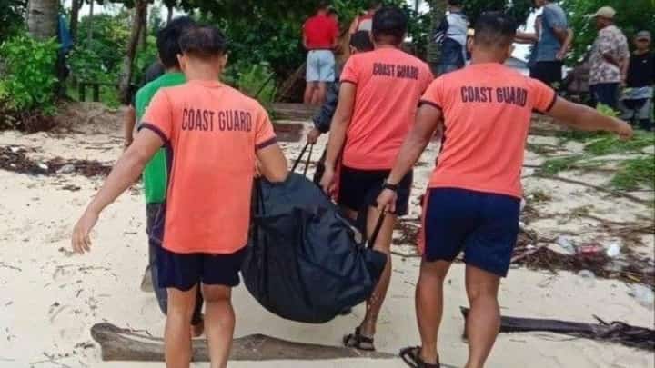 RECOVERED. Coast Guard and police personnel carry the remains of Alipio Echano Seralde Jr. following a recovery operation in El Nido, Palawan, on 30 October 2026. The 55-year-old Puerto Princesa resident had been missing since 17 October.