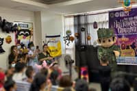 Marines bring Halloween cheer to young cancer patients