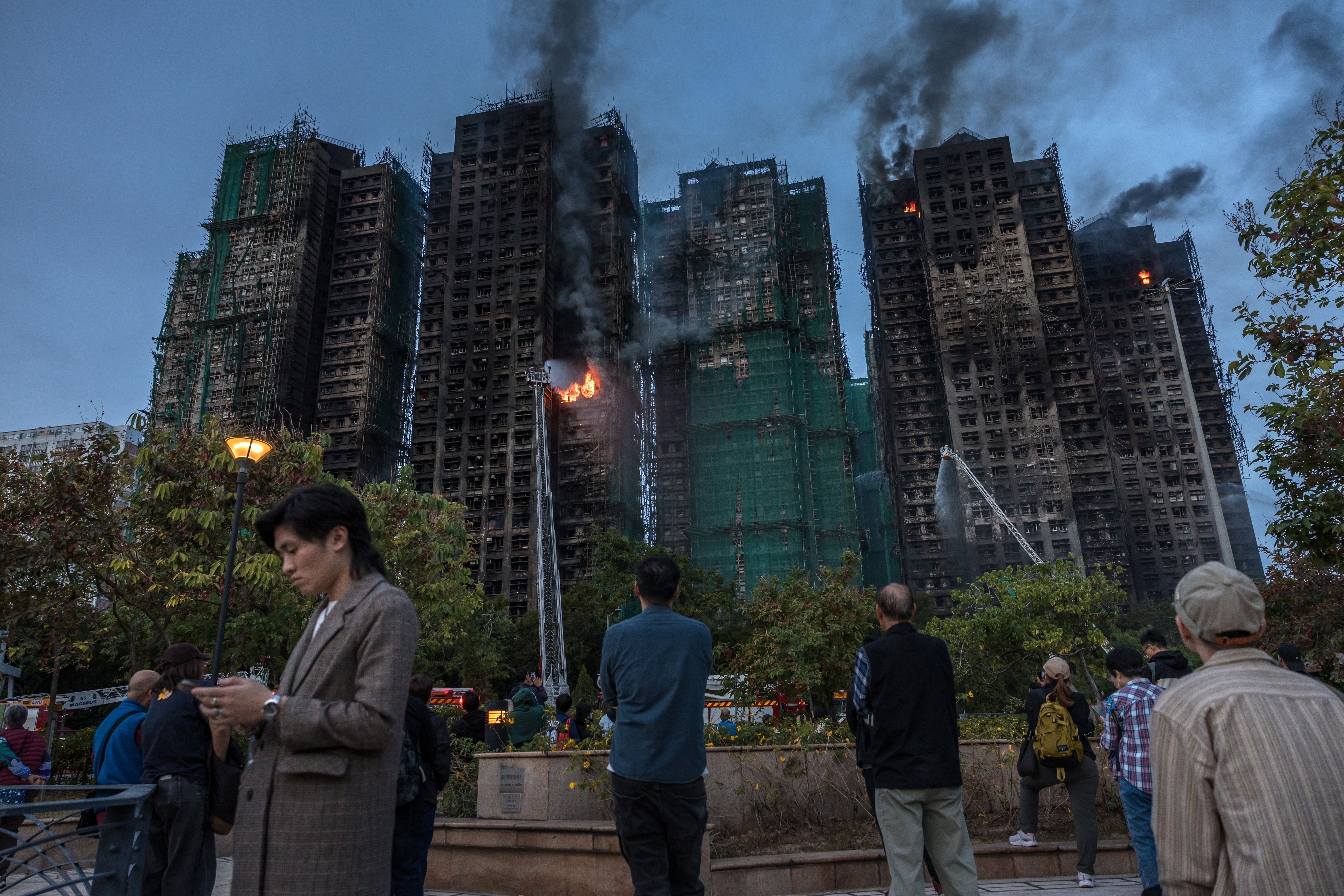Hong Kong leader apologises for deadly fire