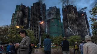Hong Kong leader apologises for deadly fire