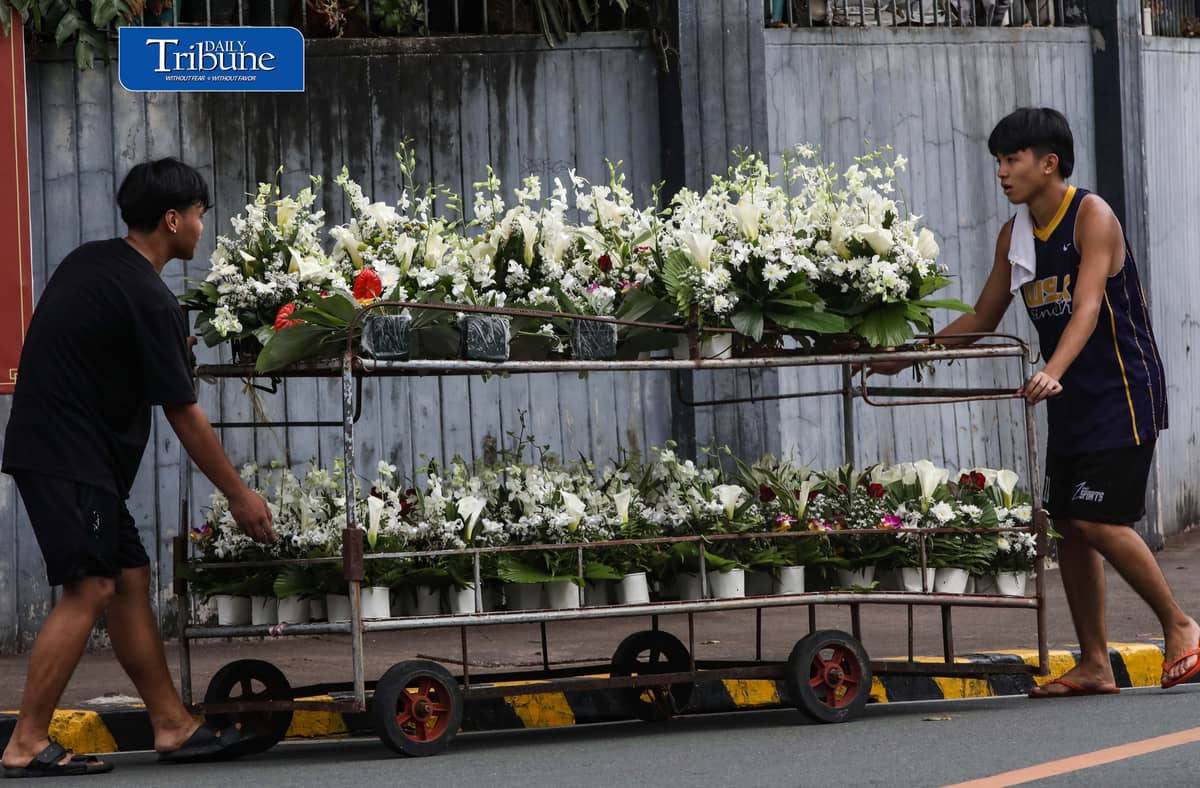 (October 31 2026) Flowers as offerings to the family members who passed away, seen for sale along the street near Loyola Memorial Park in Marikina City on Saturday October 31 2026, a day before All Souls Day celebration. Photo/Analy Labor