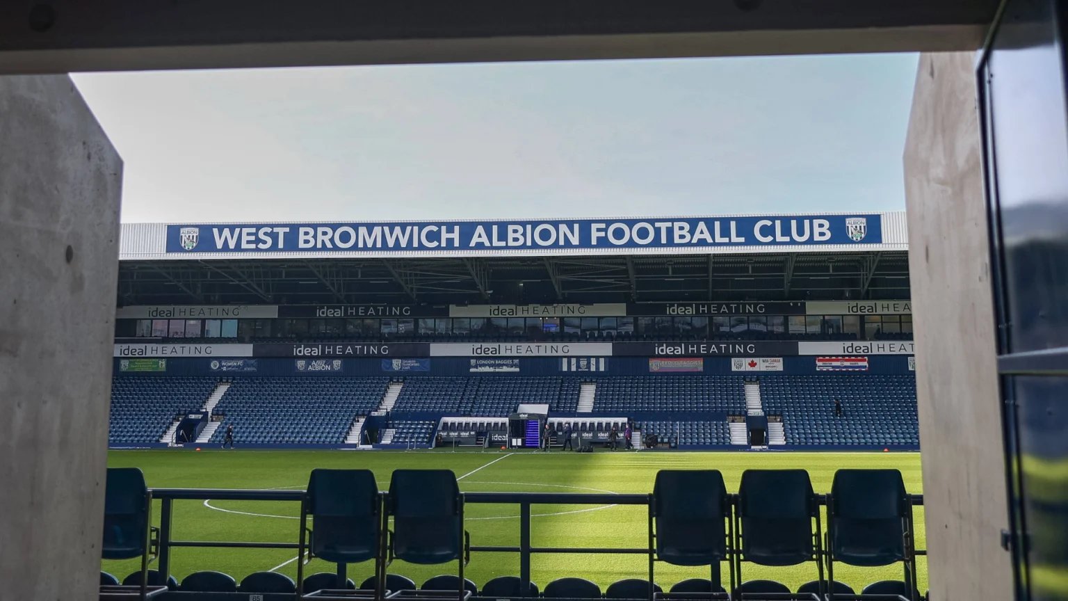 An image of The Hawthorns taken from one of the entrances to a stand